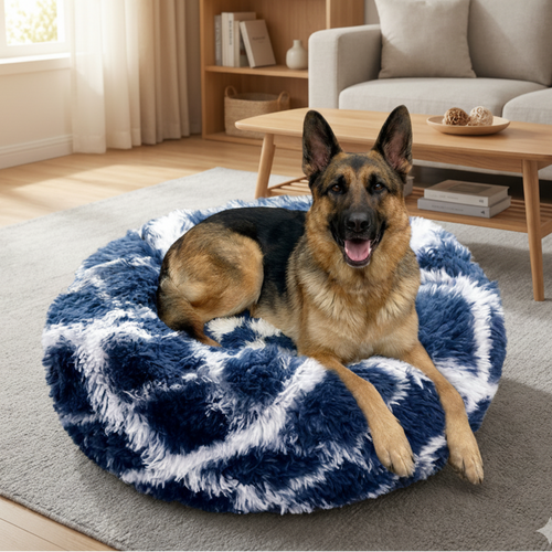 A relaxed German Shepherd resting on a soft blue AbbyPaw calming dog bed in a modern living room.
